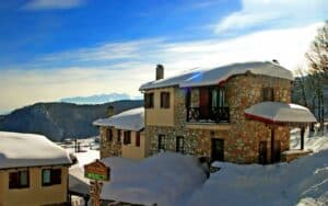visit pieria in winter and enjoy this snowy roof and ground at Pierion Musses Hotel in Plaio Elatochori, Pieria.
