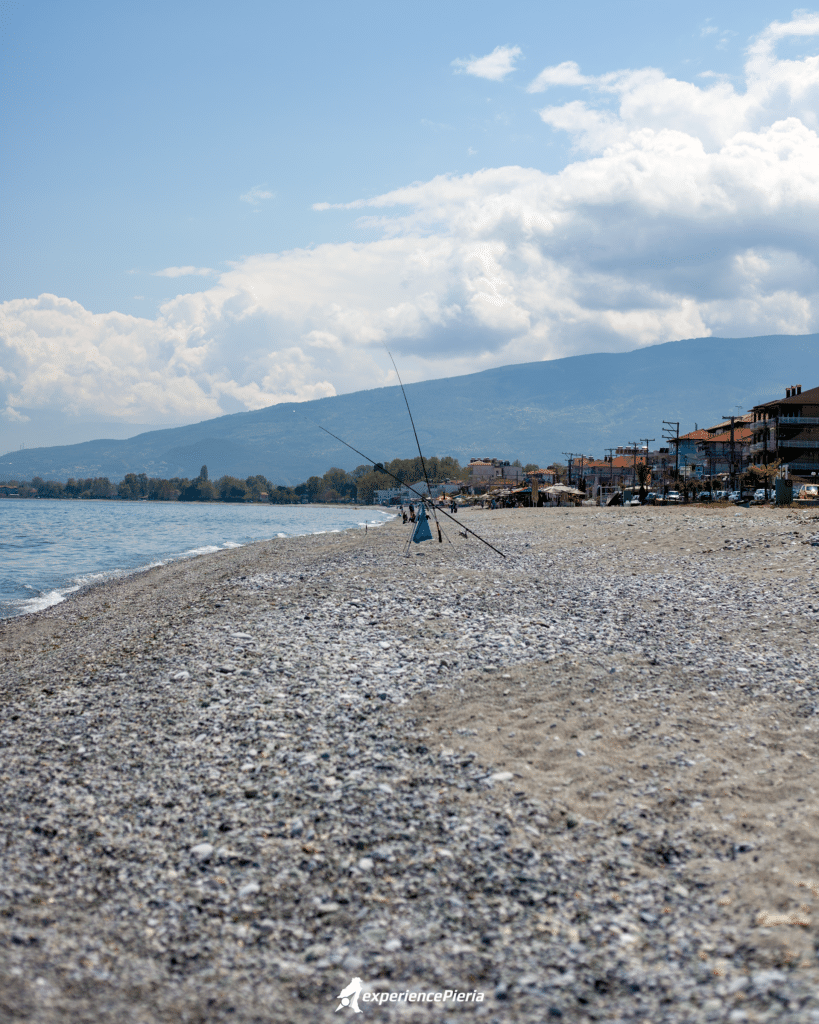 a Black fishing rod Infront of Leptokarya beach and Mount Olympus View behind, Pieria region, Greece.