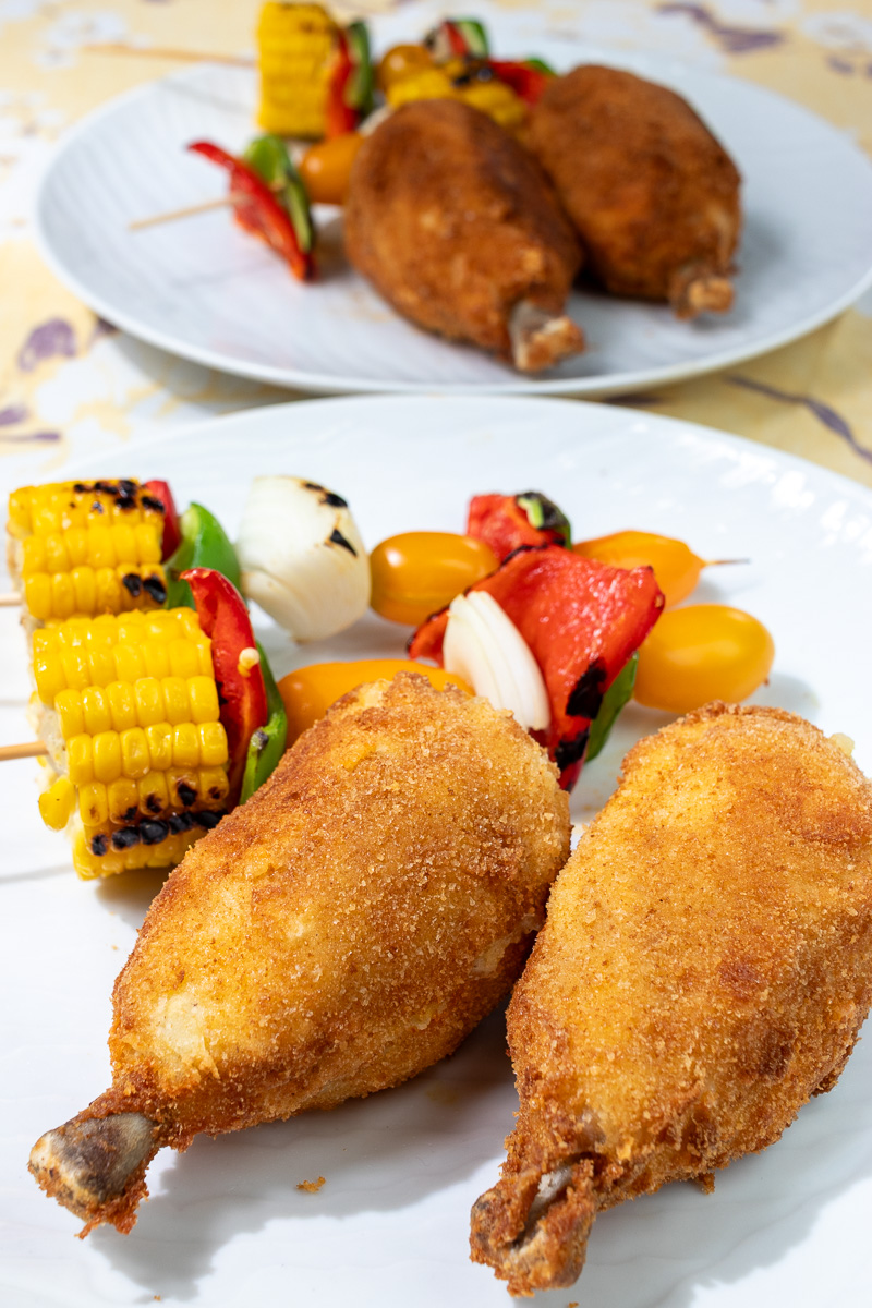 Final dish of chicken poppers and grilled veggie skewers on the balcony