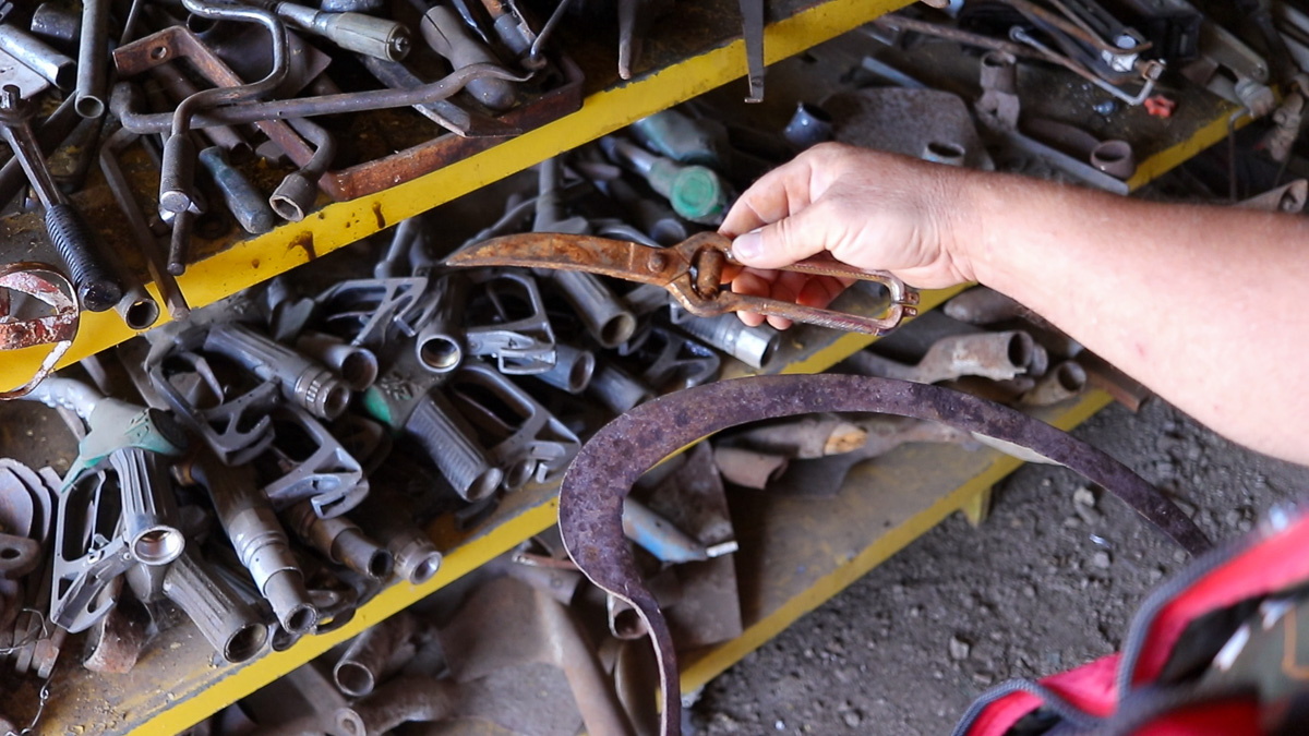 Two rusted agricultural tools found in Maria's flea shop