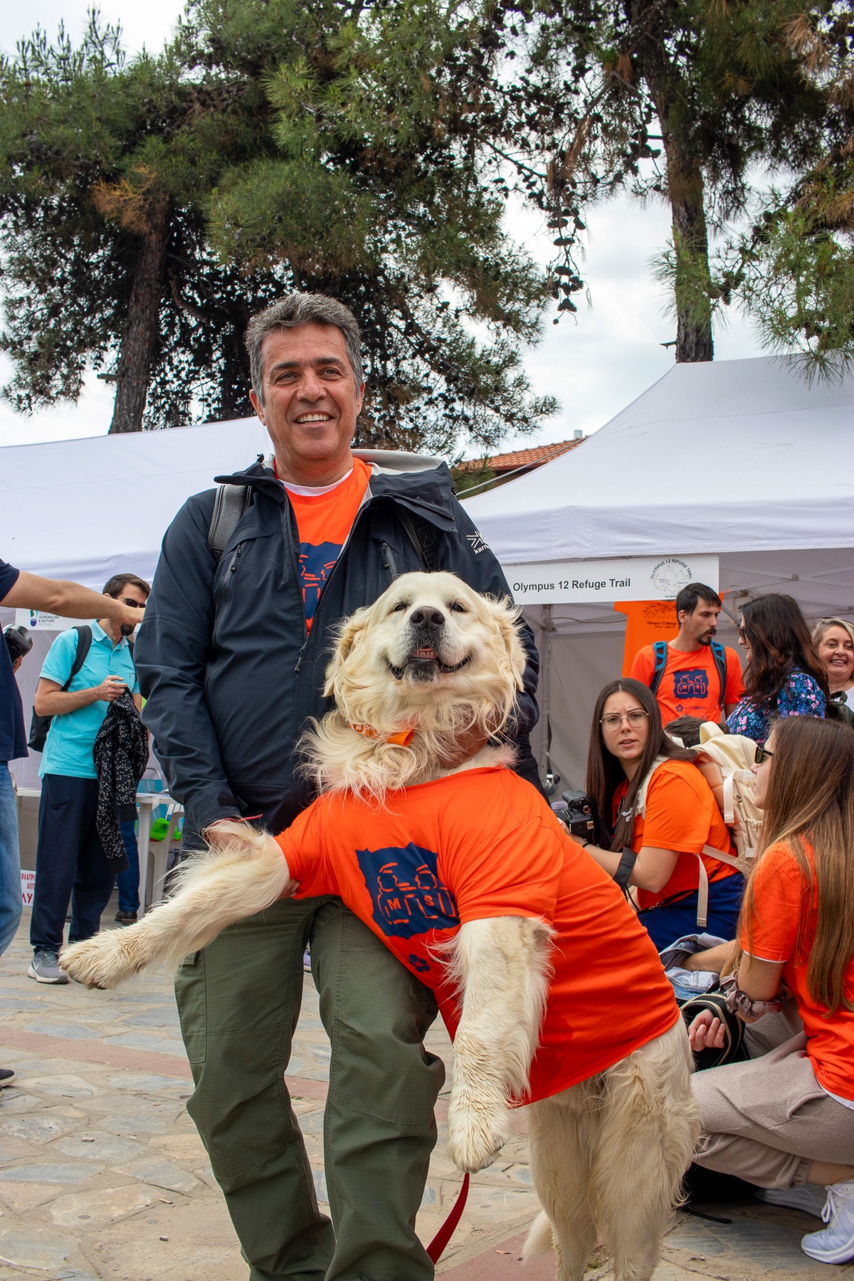 Happy visitor and a big smiling dog at the festival