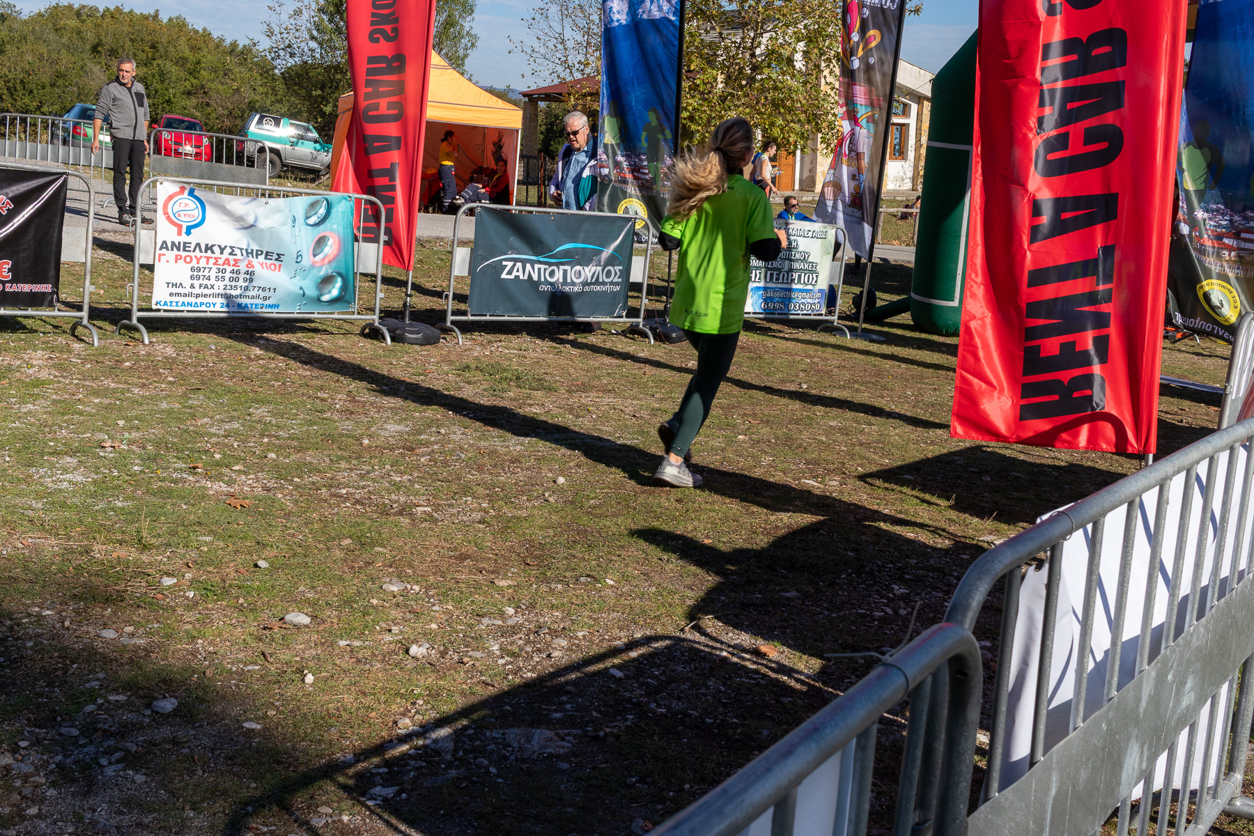 Runner approaching the finish line at North Olympus Trail 2025