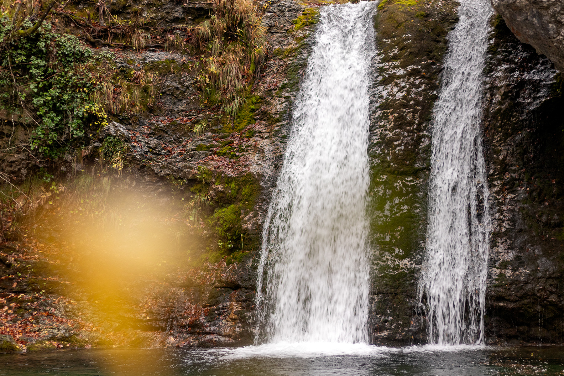Double waterfall in the Enipeas Gorge on Mount Olympus, November mist and wet rock in Pieria, Greece