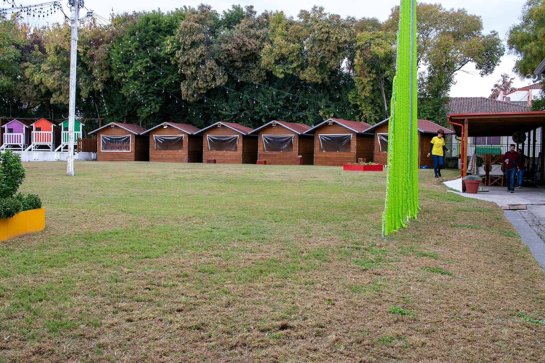 Wooden houses prepared for community events at Kapnikos Stathmos, Katerini, Pieria Greece