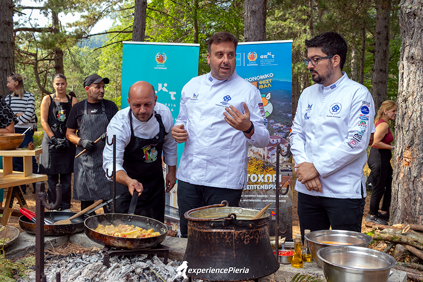 Chef Dimitris Dermisis preparing scrambled eggs over an open fire in Elatochori