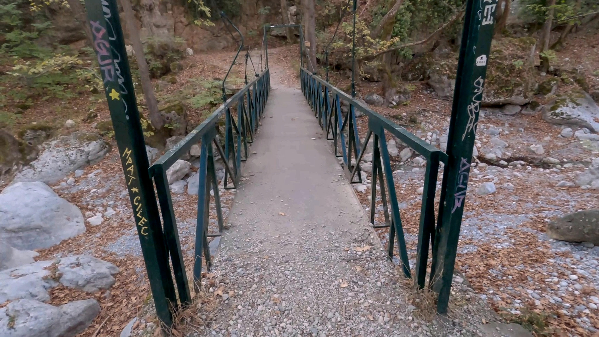 Metal pedestrian bridge over the Enipeas leading towards Myloi, Litochoro