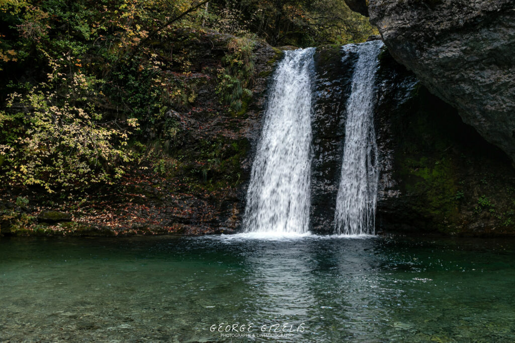 Double waterfall surrounded by the forest of Mount Olympus near Litochoro, Greece